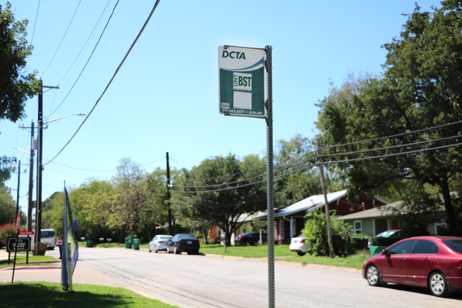 DCTA bus route sign in a Denton neighborhood