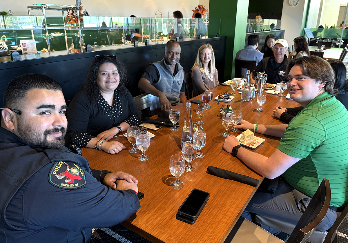 Vice President Clayton Gibson, third from left, with staff members at the November lunch.