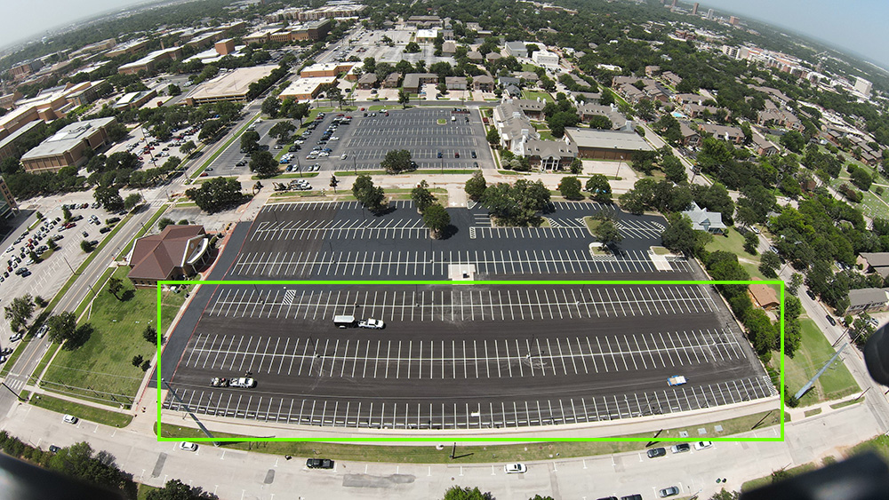 Drone aerial picture of Lot 40 with a neon green rectangle showing the expanded lot size.